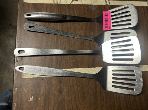 (4) STAINLESS TURNERS.
