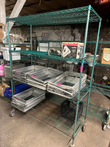 48" X 24" FOUR TIER COATED WIRE SHELF.