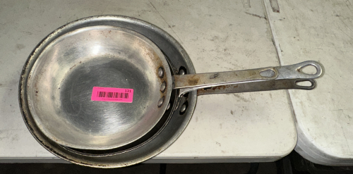 (2) ASSORTED SKILLETS.