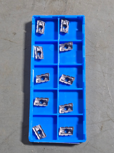 (20) CARBIDE MILLING INSERTS
