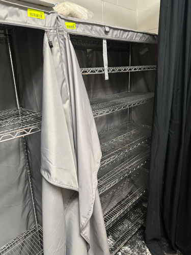 48" X 14" SEVEN TIER WIRE SHELF W/ PLASTIC COVER.