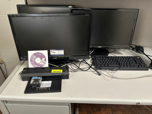(3) COMPUTER MONITORS AND (1) KEYBOARD.