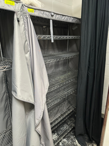 48" X 14" FIVE TIER WIRE SHELF W/ PLASTIC COVER.