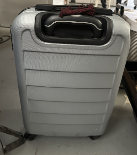 CARRY ON SUITCASE.