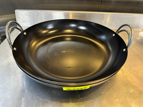 (2) WOK SKILLETS.