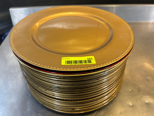 (25) GOLD PLASTIC PLATE CHARGERS.