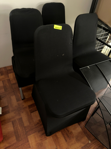 (4) CHAIRS W/ BLACK COVERS.