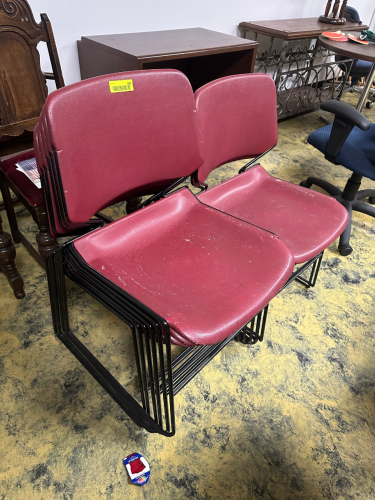 (10) PLASTIC MAROON STACKING CHAIRS.