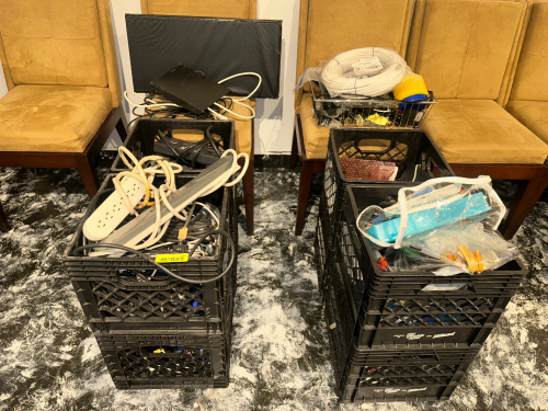 (8) MILK CRATES OF ASSORTED ELECTRONICS AND WIRES.