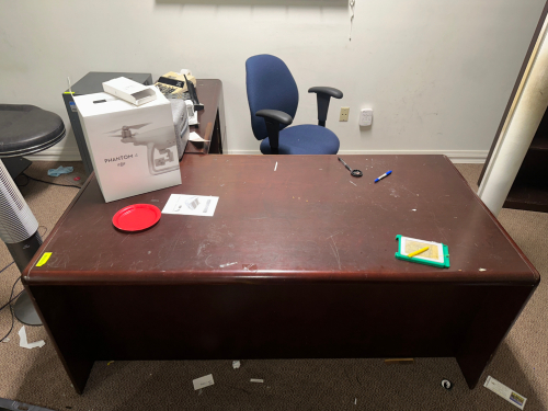L SHAPED WOODEN DESK W/ CREDENZA AND BOOK CASE.