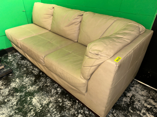 THREE CUSHION PLEATHER SECTION SOFA SECTION.
