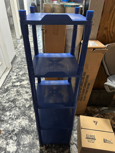 12" X 12" BLUE PLASTIC SHELF.