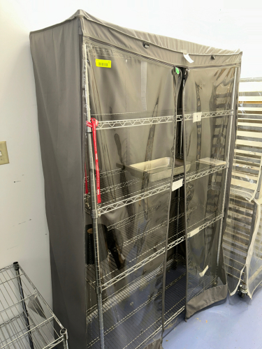 48" X 14" FIVE TIER WIRE SHELF W/ PLASTIC COVER.