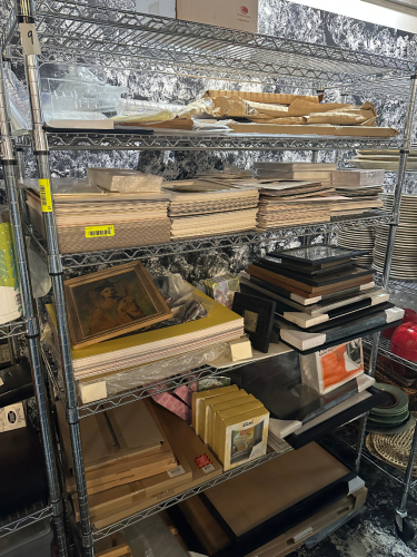CONTENTS OF SHELF - ASSORTED PICTURE FRAMES AND BOARDERS.