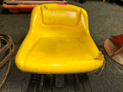 SEAT TO A JOHN DEERE TRACTOR.