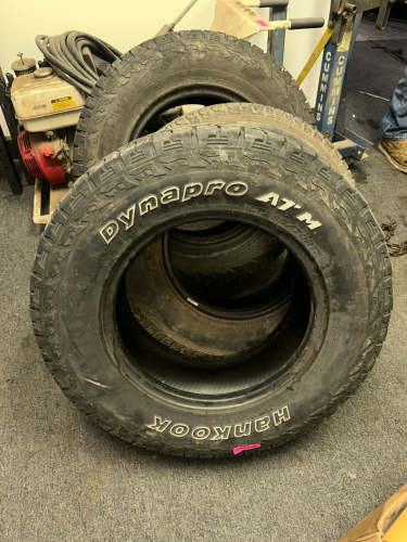 (1) LOT OF 5 ASSORTED USED TIRES.