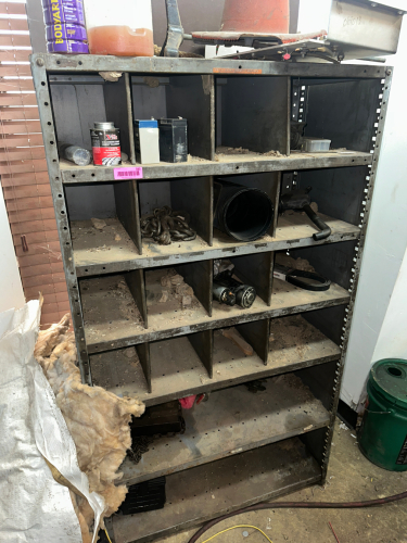 SHELF AND CONTENTS - ASSORTED HARDWARE, TOOLING, AND PARTS.