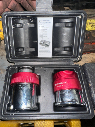 EVER TOUGH AUTOMOTIVE SERVICE TOOL SET INCLUDING RADIATOR CAP ADAPTER SET AND OXYGEN SENSOR WRENCH SET IN MOLDED STORAGE CASES.