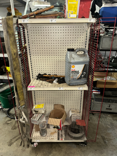 SHELF AND CONTENTS - ASSORTED HARDWARE, TOOLING, AND PARTS.