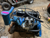 NISSAN ENGINE REMOVED FROM KOMATSU EQUIPMENT WITH CARBURETOR, DISTRIBUTOR, AND ACCESSORIES INSTALLED. IN WORKING ORDER - 4