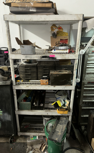 SHELF AND CONTENTS - ASSORTED HARDWARE, TOOLING, AND PARTS.