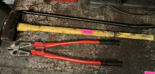 CROW BAR, SLEDGE HAMMER, AND BOLT CUTTERS.