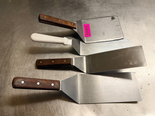 (4) STAINLESS TURNERS.
