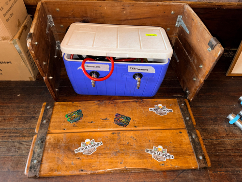 COOLER KEGERATOR / DUAL TAP BEER DISPENSER SYSTEM WITH COLD PLATE AND WOODEN BOX SURROUND.