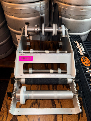ROLL LABEL DISPENSER.