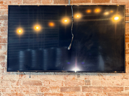 SHARP 50" WALL MOUNTED TV