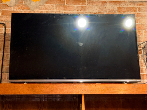 SHARP 50" WALL MOUNTED TV
