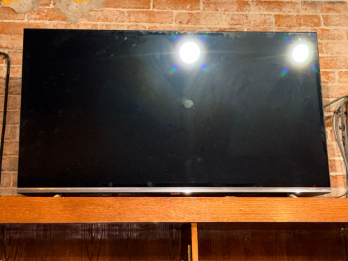 SHARP 50" WALL MOUNTED TV