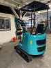COMPACT TRACK MINI EXCAVATOR WITH OPEN CANOPY, RUBBER TRACKS, AND FRONT DOZER BLADE. EQUIPPED WITH HYDRAULIC BOOM, BUCKET, AND PILOT JOYSTICK CONTROLS. IDEAL FOR TRENCHING, LIGHT EXCAVATION, AND LANDSCAPING APPLICATIONS. - 2