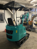 COMPACT TRACK MINI EXCAVATOR WITH OPEN CANOPY, RUBBER TRACKS, AND FRONT DOZER BLADE. EQUIPPED WITH HYDRAULIC BOOM, BUCKET, AND PILOT JOYSTICK CONTROLS. IDEAL FOR TRENCHING, LIGHT EXCAVATION, AND LANDSCAPING APPLICATIONS. - 6