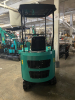 COMPACT TRACK MINI EXCAVATOR WITH OPEN CANOPY, RUBBER TRACKS, AND FRONT DOZER BLADE. FEATURES HYDRAULIC BOOM, BUCKET, AND PILOT JOYSTICK CONTROLS. IDEAL FOR LIGHT EXCAVATION, TRENCHING, AND LANDSCAPING APPLICATIONS. - 6
