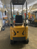 COMPACT TRACK MINI EXCAVATOR WITH OPEN CANOPY, RUBBER TRACKS, AND FRONT DOZER BLADE. FEATURES HYDRAULIC BOOM, BUCKET, AND PILOT JOYSTICK CONTROLS. IDEAL FOR LIGHT DUTY EXCAVATION, TRENCHING, AND LANDSCAPING APPLICATIONS. - 6