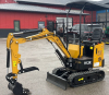 COMPACT TRACK MINI EXCAVATOR WITH OPEN CANOPY, RUBBER TRACKS, AND FRONT DOZER BLADE. FEATURES HYDRAULIC BOOM, BUCKET, AND PILOT JOYSTICK CONTROLS. SUITABLE FOR LIGHT CONSTRUCTION, TRENCHING, AND LANDSCAPING APPLICATIONS. - 2