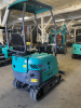 COMPACT TRACK MINI EXCAVATOR WITH OPEN CANOPY, RUBBER TRACKS, AND FRONT DOZER BLADE. EQUIPPED WITH HYDRAULIC BOOM AND BUCKET, PILOT JOYSTICK CONTROLS, AND REAR ENGINE COMPARTMENT. COMPACT DESIGN IDEAL FOR LIGHT CONSTRUCTION, LANDSCAPING, AND TRENCHING APP - 6