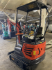 COMPACT TRACK MINI EXCAVATOR WITH OPEN CANOPY, RUBBER TRACKS, AND FRONT DOZER BLADE. EQUIPPED WITH HYDRAULIC BOOM AND BUCKET, SIDE CONTROL JOYSTICKS, AND REAR ENGINE COMPARTMENT. COMPACT DESIGN SUITABLE FOR LIGHT CONSTRUCTION AND TRENCHING APPLICATIONS. - 2
