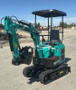 COMPACT TRACK MINI EXCAVATOR WITH OPEN CAB, RUBBER TRACKS, AND FRONT DOZER BLADE. HYDRAULIC BOOM WITH BUCKET ATTACHMENT AND CONTROL LEVERS. UNIT FEATURES PROTECTIVE CANOPY, REAR ENGINE ACCESS, AND COMPACT FRAME DESIGN.