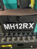 COMPACT TRACK MINI EXCAVATOR WITH OPEN CAB, RUBBER TRACKS, AND FRONT DOZER BLADE. HYDRAULIC BOOM WITH BUCKET ATTACHMENT AND CONTROL LEVERS. UNIT FEATURES PROTECTIVE CANOPY, REAR ENGINE ACCESS, AND COMPACT FRAME DESIGN. - 4