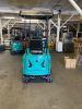 COMPACT TRACK MINI EXCAVATOR WITH OPEN CAB, RUBBER TRACKS, AND FRONT DOZER BLADE. HYDRAULIC BOOM WITH BUCKET ATTACHMENT AND CONTROL LEVERS. UNIT FEATURES PROTECTIVE CANOPY, REAR ENGINE ACCESS, AND COMPACT FRAME DESIGN. - 5