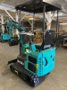 COMPACT TRACK MINI EXCAVATOR WITH OPEN CAB, RUBBER TRACKS, AND FRONT DOZER BLADE. HYDRAULIC BOOM WITH BUCKET ATTACHMENT AND CONTROL LEVERS. UNIT FEATURES PROTECTIVE CANOPY, REAR ENGINE ACCESS, AND COMPACT FRAME DESIGN. - 2