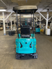 COMPACT TRACK MINI EXCAVATOR WITH OPEN CAB, RUBBER TRACKS, AND FRONT DOZER BLADE. HYDRAULIC BOOM WITH BUCKET ATTACHMENT AND CONTROL LEVERS. UNIT FEATURES PROTECTIVE CANOPY, REAR ENGINE ACCESS, AND COMPACT FRAME DESIGN. - 3