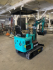 COMPACT TRACK MINI EXCAVATOR WITH OPEN CAB, RUBBER TRACKS, AND FRONT DOZER BLADE. HYDRAULIC BOOM WITH BUCKET ATTACHMENT AND CONTROL LEVERS. UNIT FEATURES PROTECTIVE CANOPY, REAR ENGINE ACCESS, AND COMPACT FRAME DESIGN. - 6