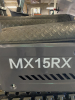 COMPACT TRACK MINI EXCAVATOR WITH OPEN CAB, RUBBER TRACKS, AND FRONT BLADE. HYDRAULIC BOOM WITH BUCKET ATTACHMENT AND CONTROL LEVER OPERATION. UNIT FEATURES PROTECTIVE CANOPY, REAR ENGINE COMPARTMENT, AND COMPACT BODY DESIGN. - 4