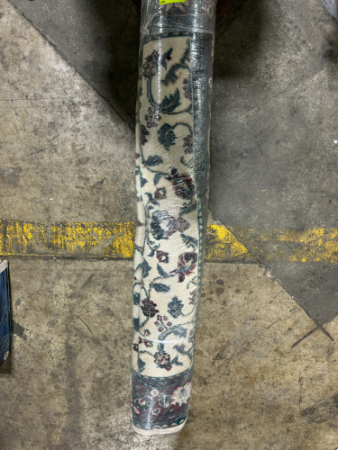 RUG WITH FLORAL PATTERN