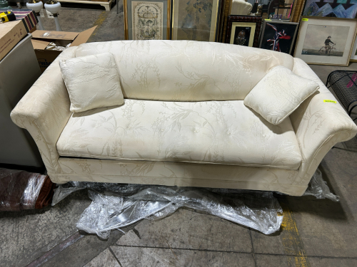CREAM COLORED SOFA WITH IVY SCROLLS PATTERN
