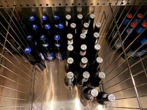 CONTENTS OF BOTTLE BOX - 30 ASSORTED BEER BOTTLES.