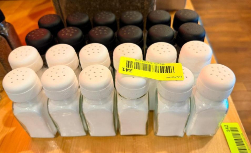 (24) GLASS SALT AND PEPPER SHAKERS WITH PLASTIC FOREVER LIDS.
